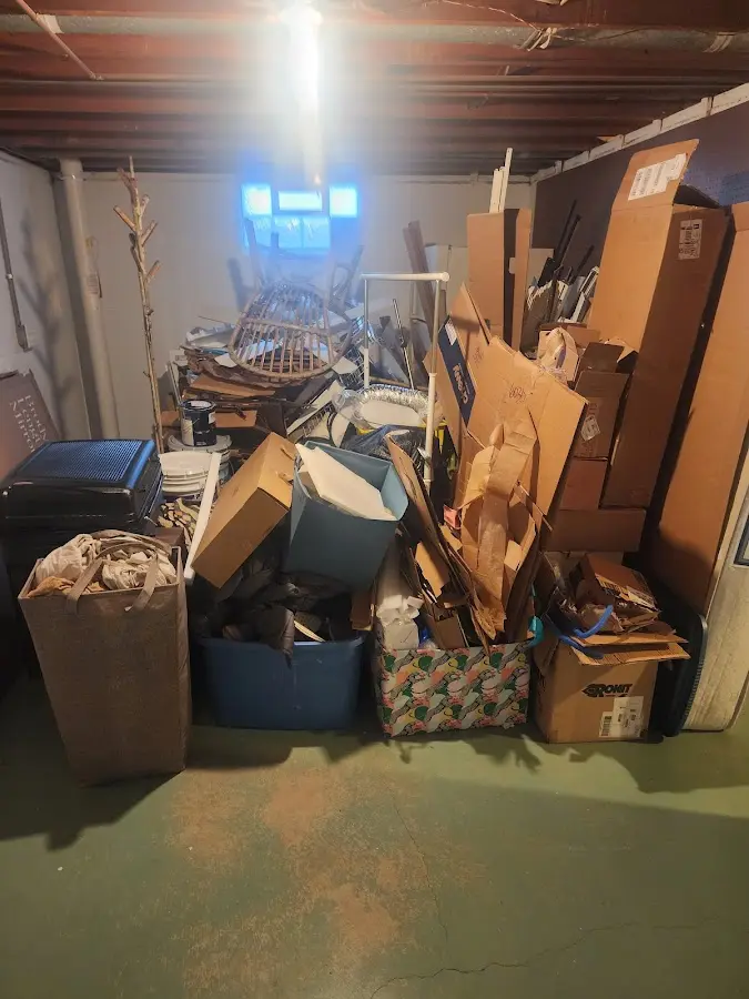 Roll-off dumpster container at job site for 2 Yard Dumpster Rental in Chatham